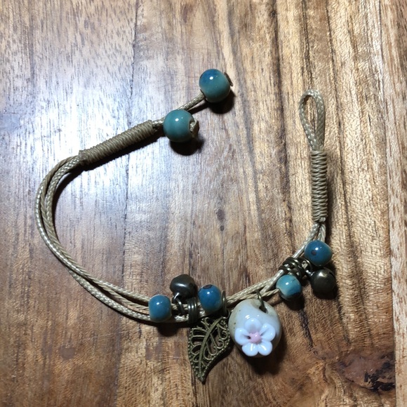 3/$25 Green Bead with Flower and Leaf Charms on Rope Bracelet - Picture 3 of 6
